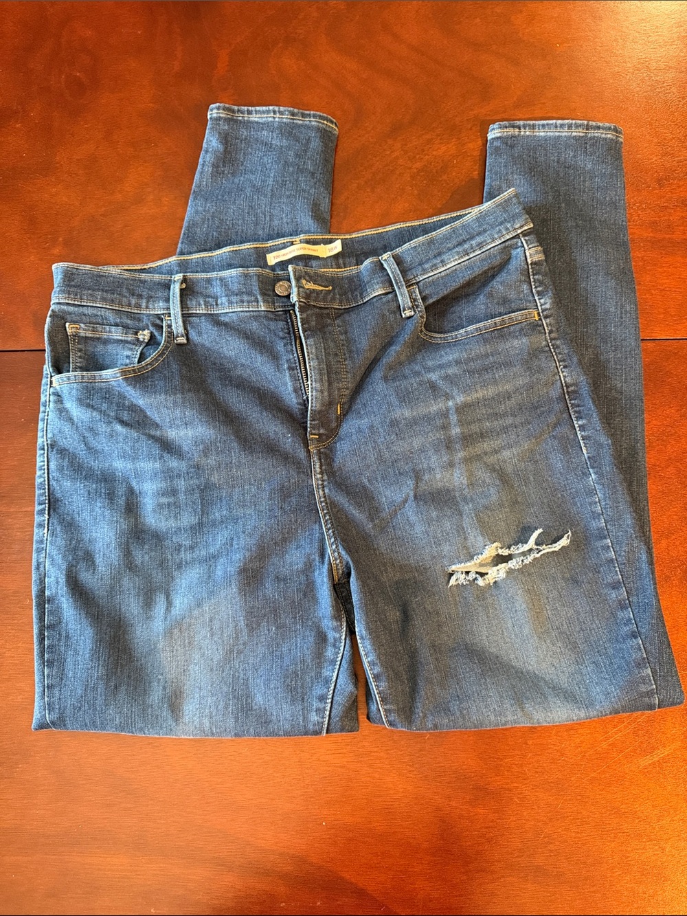 Levi's 720 women’s plus high rise super skinny Jeans with Distressed knees